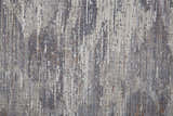 Close-up of Feizy Lennon Taupe/Tan/Orange Area Rug. Abstract design with vertical stripes in neutral and warm hues. Texture