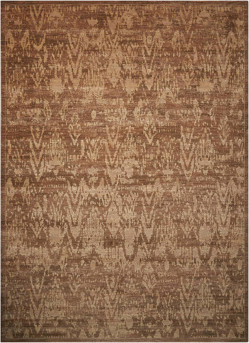 Close-up of the Nourison Silken Allure Chocolate Persian rug. Brown wool rug with distressed, abstract Persian-inspired design.