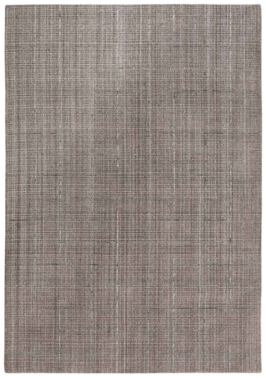 Close-up of the hand-loomed Rizzy KIK691 area rug. Features a subtle gray color and a simple, textured pattern with blue accents. Design-Rectangle