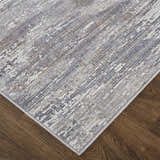 Close up of the Feizy Lennon Taupe/Tan/Orange Area Rug showing abstract pattern and texture. Corner