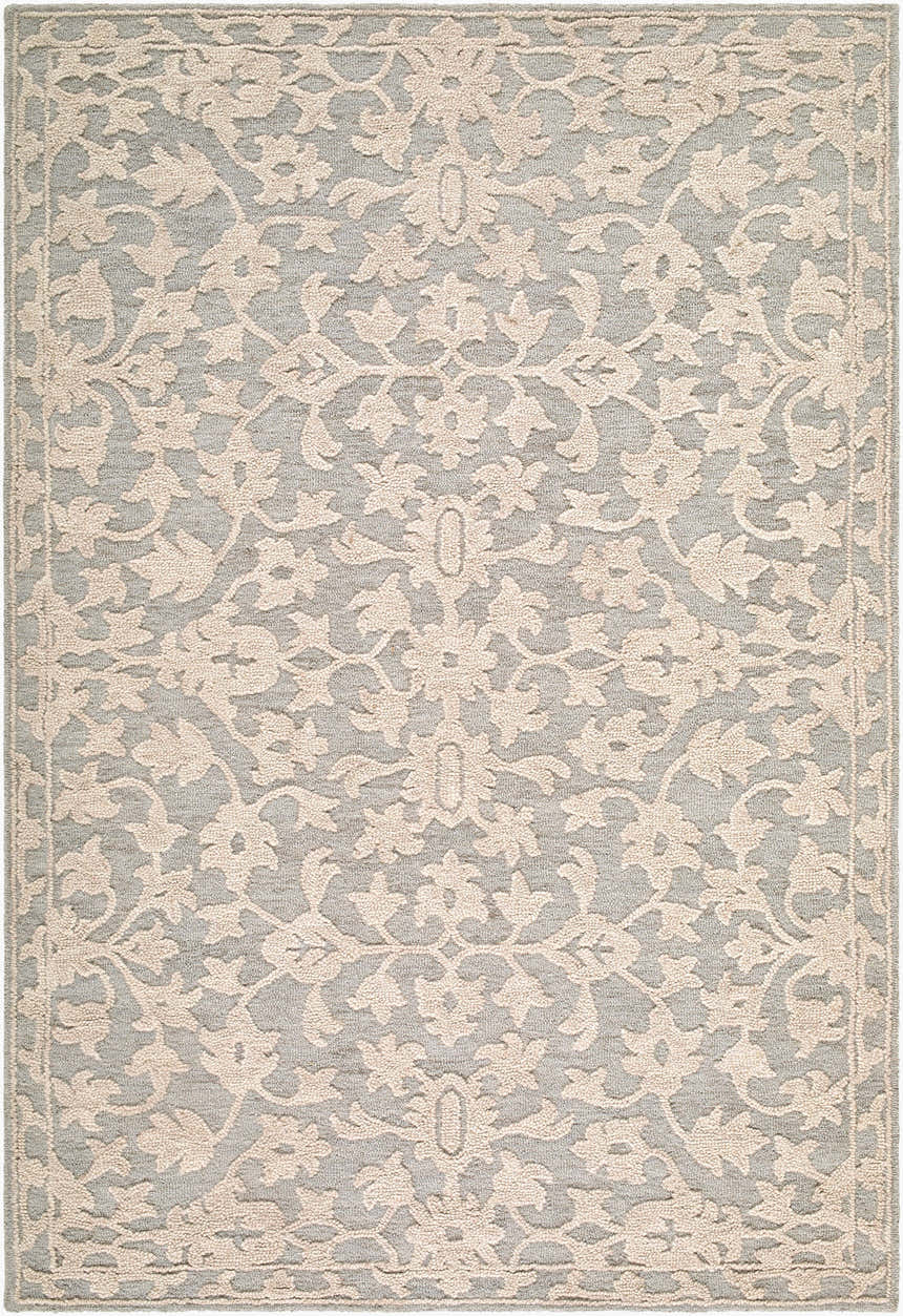 Close-up of the Hiromi Cugydu rug. Hand-tufted wool rug in beige, cream, and taupe with a traditional floral pattern. Design-Rectangle-576