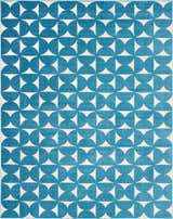 Close-up of Nourison Harper Blue Colorful Area Rug featuring a geometric semi-circle pattern.
