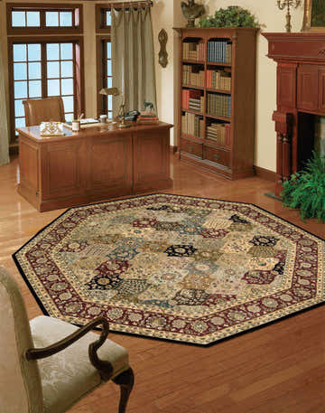 Traditional home office with Nourison 2000 Multicolor Persian rug, wood desk, bookcase, and fireplace.