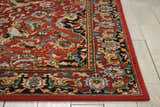 Close-up of the Nourison Timeless Red Traditional Indoor Area Rug, showcasing its floral pattern and wool texture.