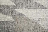 Close-up of the Feizy Alford Area Rug. Ivory, gray, and taupe wool with a geometric pattern and hand-knotted texture. Texture