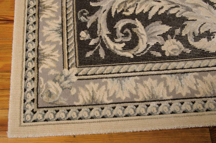 Close-up of the Michael Amini Platine Ivory Vintage Area Rug showing chestnut, ivory, and gray floral pattern and soft texture.