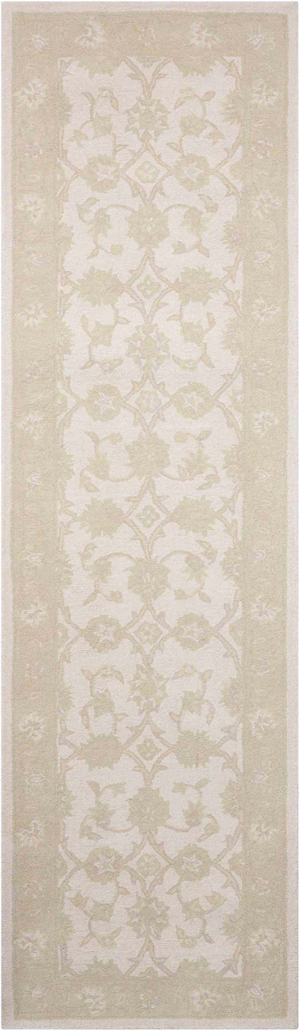 Close-up of Nourison Zephyr Ivory/Green rug. Handmade wool runner with chestnut floral pattern and border.