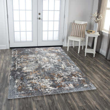 Entryway with Rizzy LOG735 area rug. Abstract design in blue, gray, ivory, and rust colors. Modern, stylish decor. Roomscene-Rectangle
