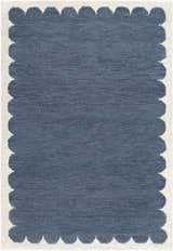 Close-up of the Lukamu Modern Art Deco rug. Blue wool rug with a scalloped ivory border. Hand-tufted rectangular rug. Design-Rectangle