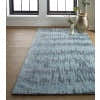 Living room with a Feizy Dryden rug in blue, green, and gray. Abstract design on wood floor. Roomscene-Rectangle