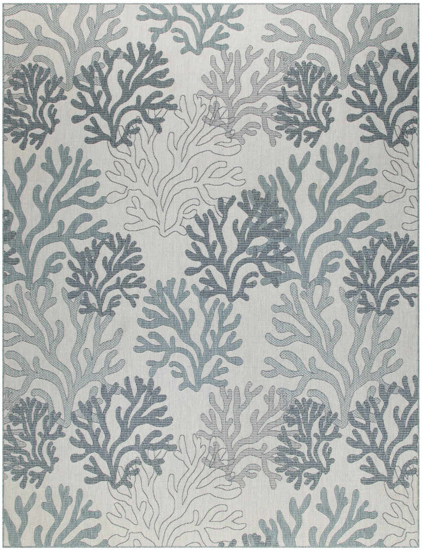 Close-up of Nourison Garden Oasis Blue Coastal Area Rug. Features a coral pattern in light blue and gray on a cream background.