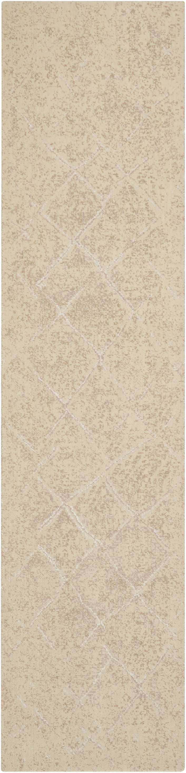 Close-up of Nourison Silk Elements Natural Persian rug. Beige wool rug with subtle diamond pattern.