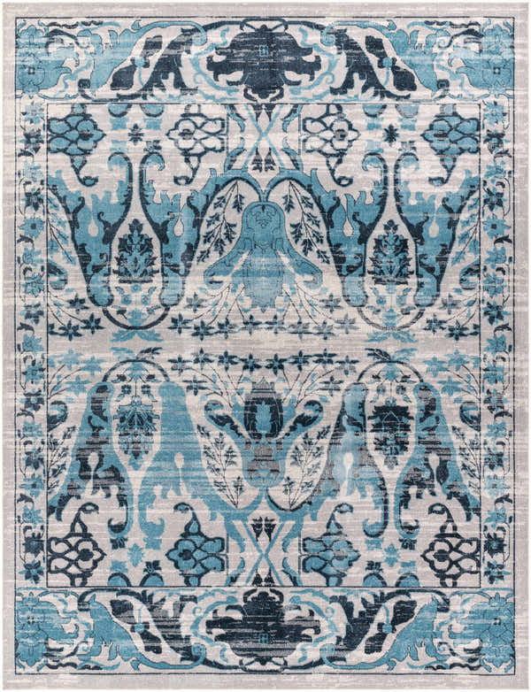 Close-up of the Macalaya Washable Area Rug. Features a traditional oriental design in blue, gray, and ink blue hues. Design-Rectangle-71010