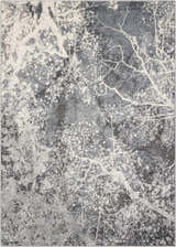Close-up of the Nourison Maxell Grey area rug, featuring a modern abstract tree branch design in shades of gray and white.