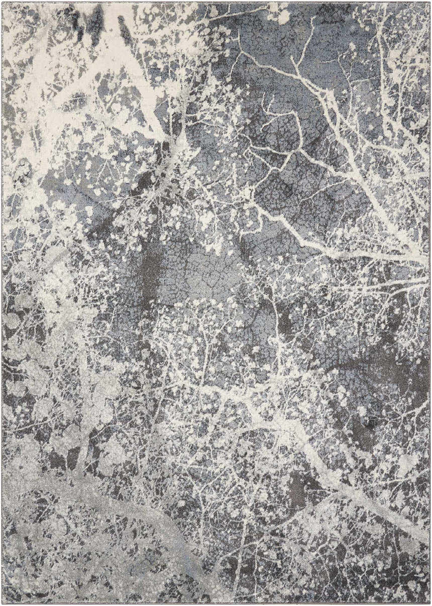 Close-up of the Nourison Maxell Grey area rug, featuring a modern abstract tree branch design in shades of gray and white.