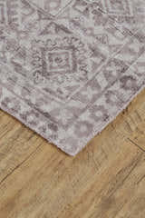 Close-up of Feizy Nadia Gray/Purple Area Rug showing the bordered, transitional design and soft viscose texture. Corner