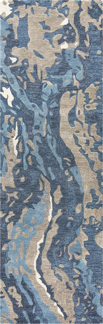 Close-up of the Rizzy MO867A area rug. Contemporary design in beige, gray, navy, and taupe. Hand-tufted wool rug texture. Design-Runner