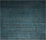 Close-up of the Nourison Nightfall Antique Green Area Rug, showing its subtle, vintage-inspired pattern and soft wool texture.