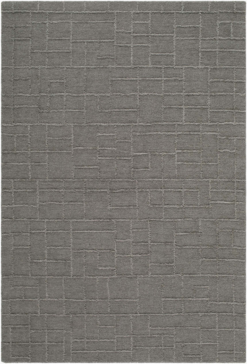 Close-up of the Giersleben Area Rug. Hand-tufted 100% wool rug in charcoal with a contemporary geometric brick pattern. Design-Rectangle-576