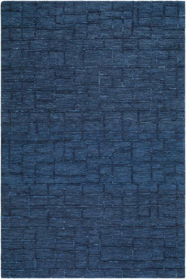 Close-up of the Carastelec Area Rug. Hand-tufted 100% wool rug in blue, denim, and midnight blue with a contemporary block pattern. Design-Rectangle-576