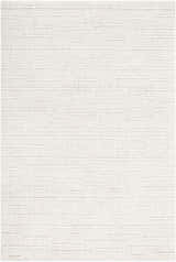 Close-up of the hand-tufted Larkollen Area Rug. The 100% wool rug features a contemporary, textured block pattern in off-white. Design-Rectangle-576