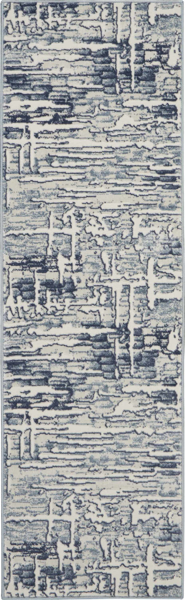 Close-up of the Nourison Urban Chic Ivory rug, showcasing its chestnut abstract pattern and soft texture.