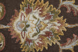 Close-up of Feizy Prescott rug showing hand-tufted wool texture and traditional oriental floral pattern in brown, tan, ivory. Texture