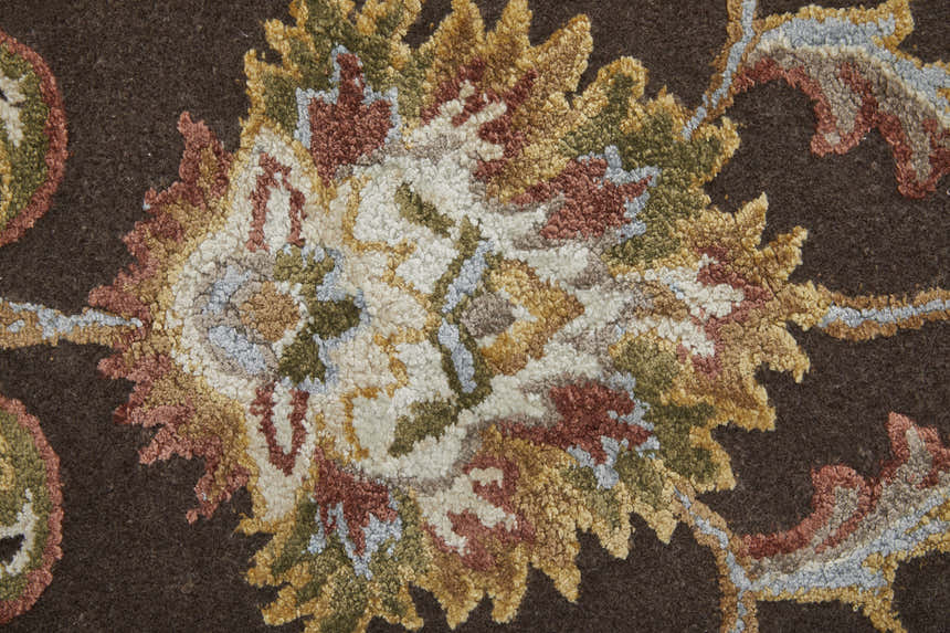 Close-up of Feizy Prescott rug showing hand-tufted wool texture and traditional oriental floral pattern in brown, tan, ivory. Texture