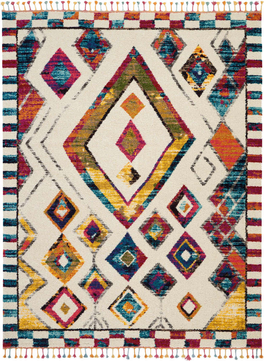 Close-up of Nourison Nomad Ivory Multicolor Tribal rug, featuring diamond patterns and colorful tassels.