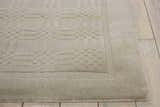 Close up of the grey Nourison Westport rug showing its wool texture and subtle geometric pattern.