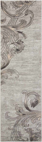 Close-up of Nourison Maxell Graphite rug. Contemporary style with a swirling floral pattern in shades of gray and beige.