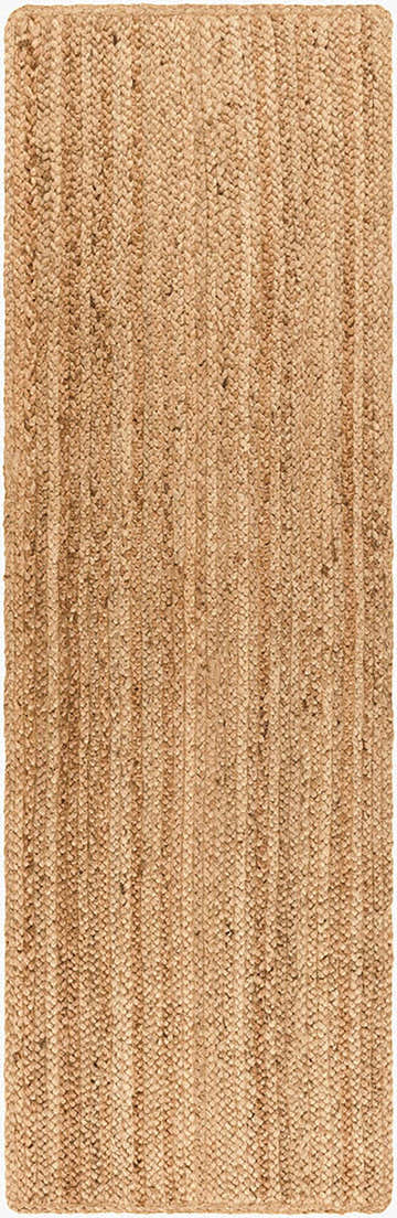 Close-up of the Shippagan Tan Jute Braided Rug. Natural jute rug with a braided texture and tan color. Hand woven rug. Design-Runner-268