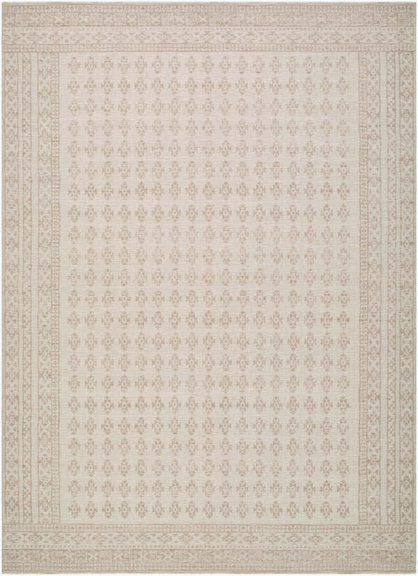 Close-up of the Shanti Nabela Noor Home x LIVABLISS rug. The design features a traditional taupe pattern on an off-white jute and polyester blend. Design-Rectangle-679