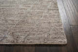 Close-up of the handmade Nourison OCEAN Ash area rug; shows ash color, subtle pattern, and textured pile.