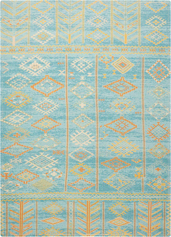 Close-up of Nourison Madera Sky Blue rug. Tribal design with orange, yellow, and white geometric patterns on a sky blue background.