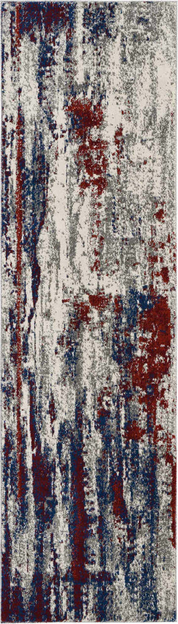 Close-up of Nourison Maxell Multicolor rug. Abstract design in red, blue, and gray on a neutral background. Modern style.