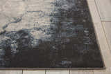 Close up of the Nourison Maxell Ivory Grey rug showing the abstract pattern and soft texture.