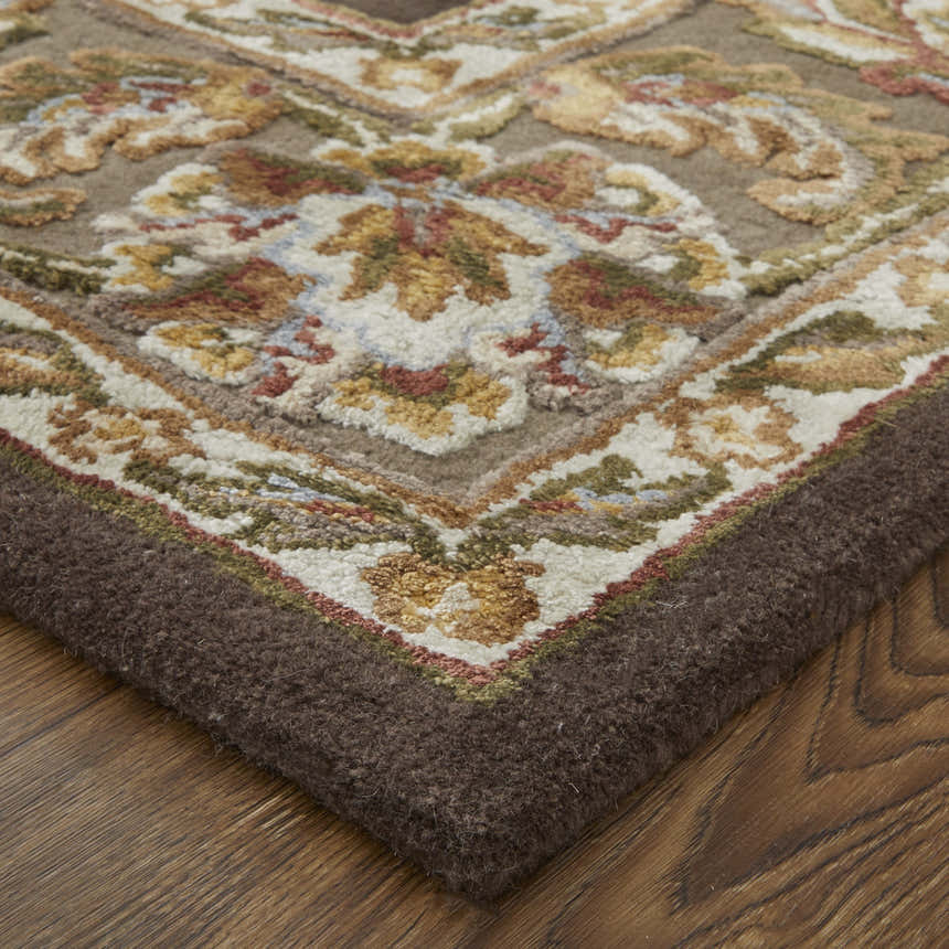 Close-up of the Feizy Prescott Brown/Tan/Ivory Area Rug featuring a traditional floral pattern and textured wool blend. Corner