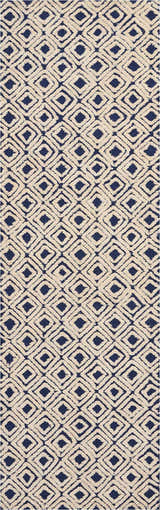 Close-up of Nourison Deco Mod Navy Ivory rug. Diamond pattern, mid-century modern style, handmade texture.