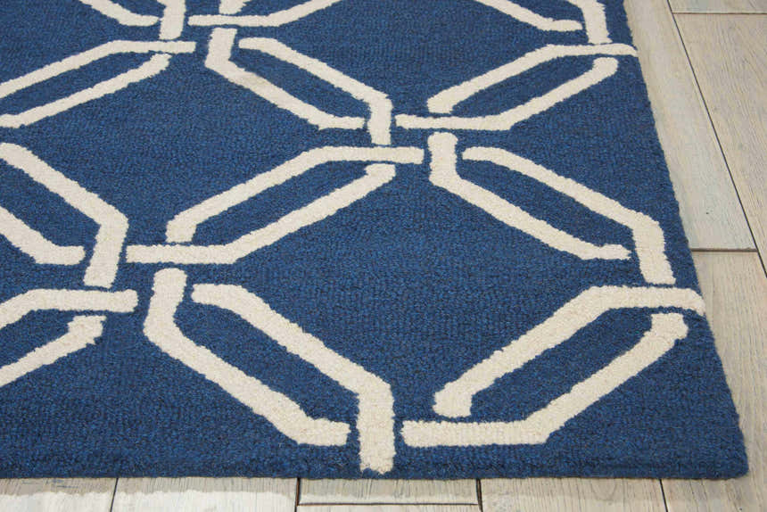 Close-up of the Nourison Linear Navy Modern Indoor Area Rug showing its wool texture and geometric chain pattern.