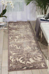 Entryway scene with ivory walls and Nourison Graphic Illusions Chestnut runner rug with floral pattern.