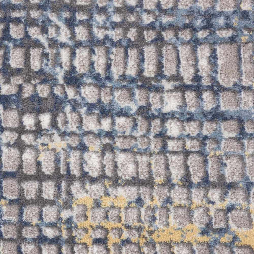 Close up of Nourison Urban Decor Grey Ivory rug showing a geometric grid pattern.