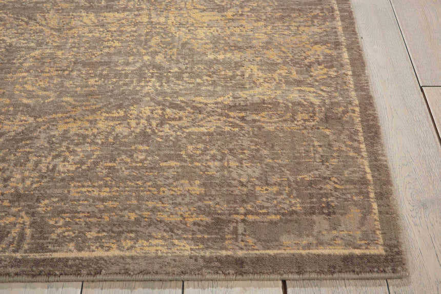 Close up of the Nourison Silken Allure Mushroom Persian rug showing its texture and subtle gold pattern.