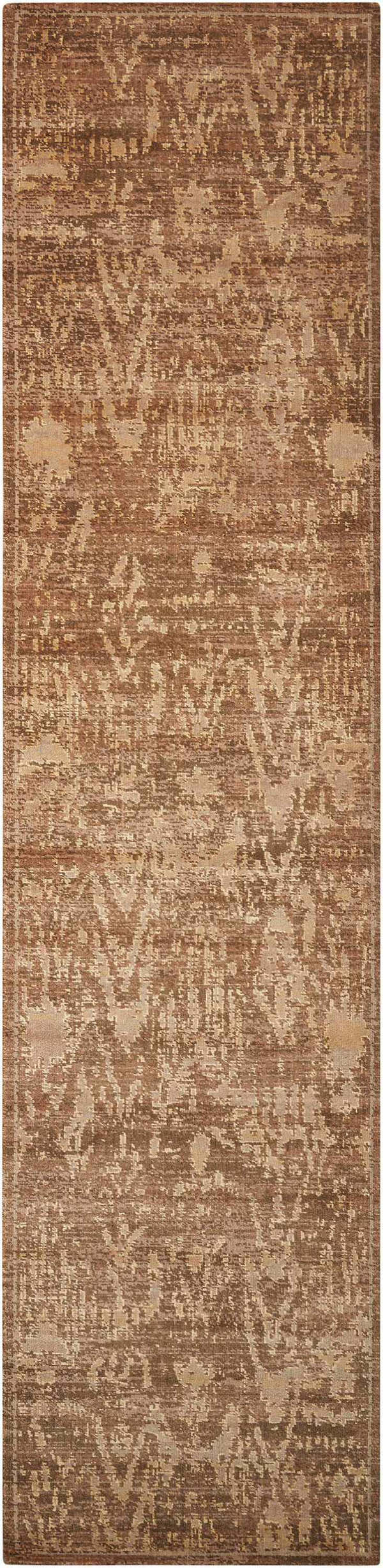 Close-up of the brown Nourison Silken Allure Chocolate Persian rug. Features a distressed, abstract design and soft texture.