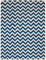 Close-up of the Nourison Portico Navy Colorful Area Rug featuring a bold, geometric chevron pattern.