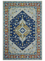 Ollie Traditional Blue And Ivory Hand Tufted Wool Rug