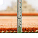 Orange Solid ground with Border Pattern Loomed Wool Area Rug