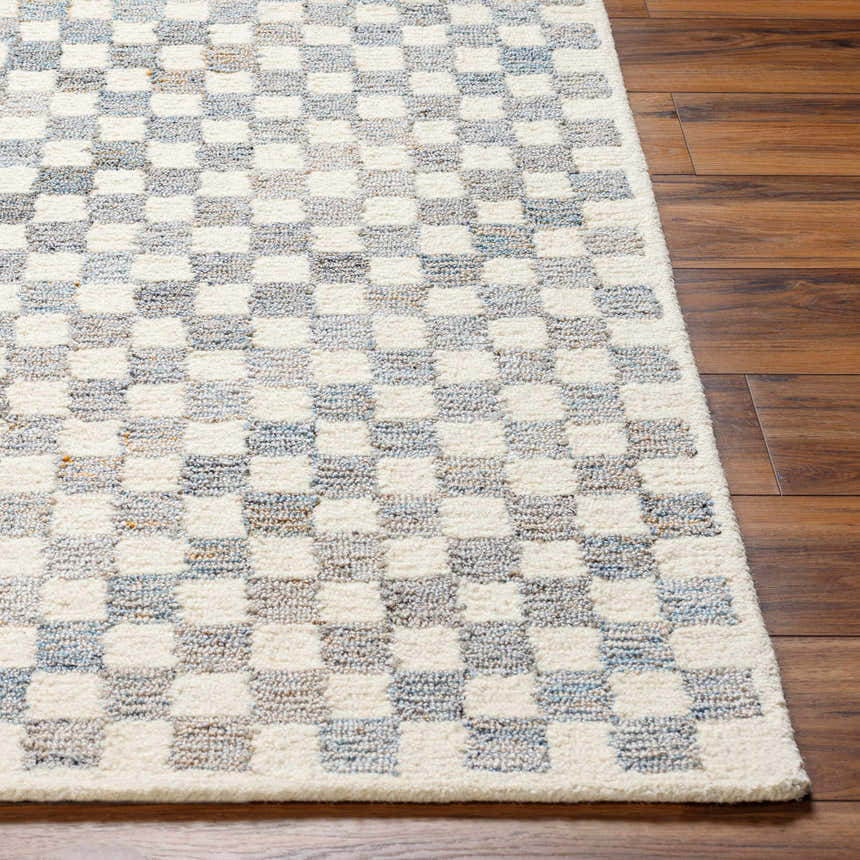 Close-up of the Halen Gray Checkered Area Rug showing the geometric checker pattern and wool texture on wood floors. Front
