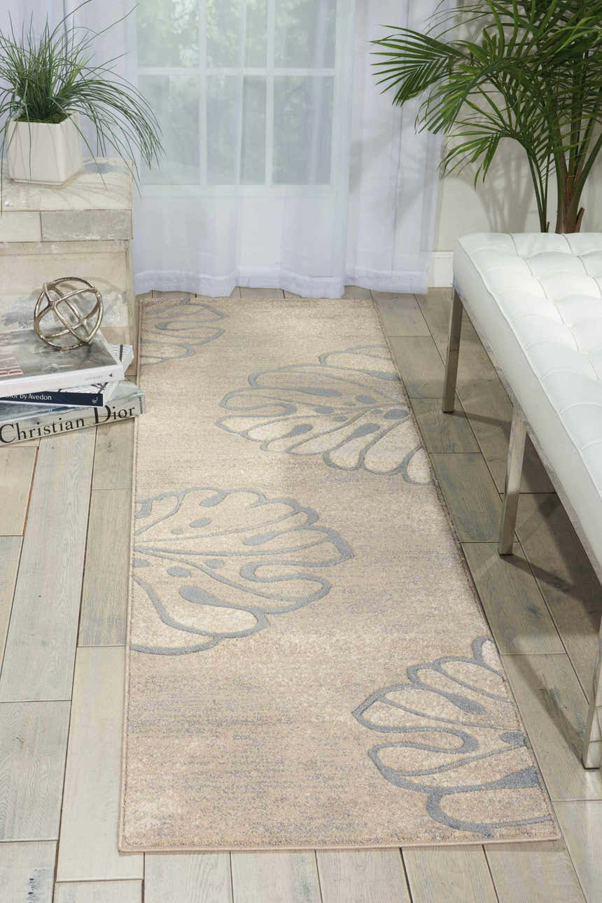 Entryway with Nourison Maxell Beige runner rug, floral pattern, white bench, wood floors, and natural light.