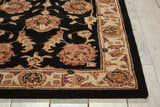 Close-up of the Nourison Heritage Hall Freeform Black Persian Rug, showcasing its floral pattern and wool texture.